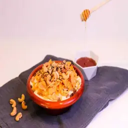 Areekah With Cream, Honey, Cheese, Cornflakes, And Cashews
